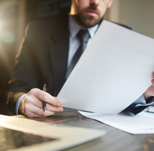 businessman working with documentation at desk
